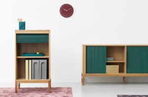 Wood storage furniture with green accent doors