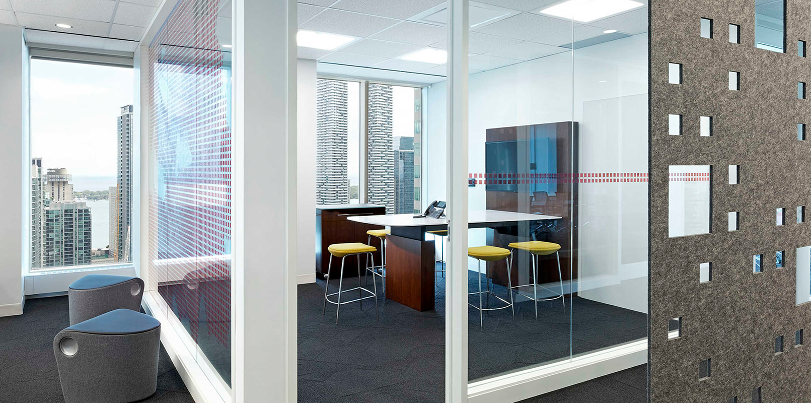 Private meeting room with yellow chairs