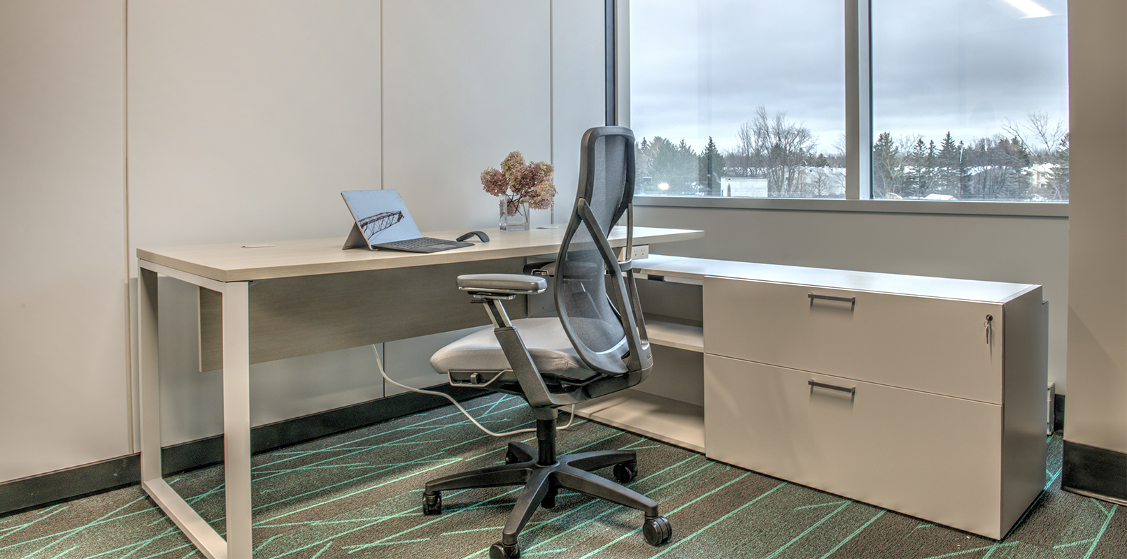 View of interior of a private office desk