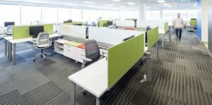Open concept office space with accent colour dividers