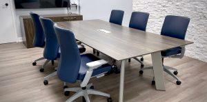 Boardroom desk with blue chairs
